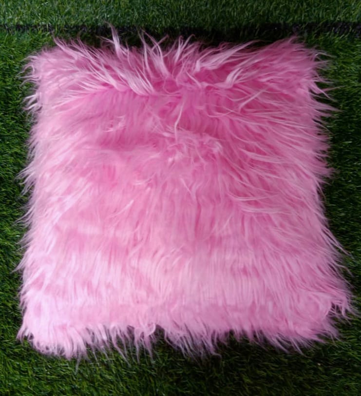 Dark pink fur cushion